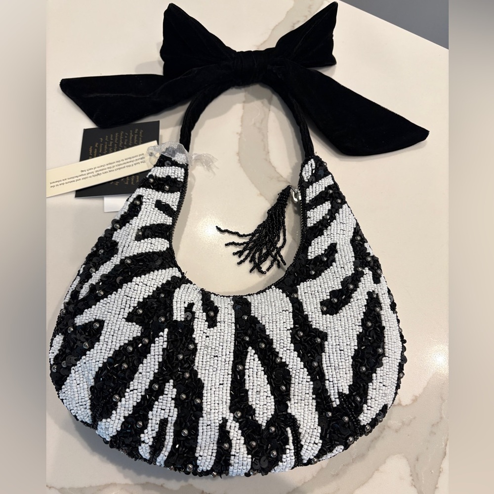 From India to You zebra beaded bag with velvet bow